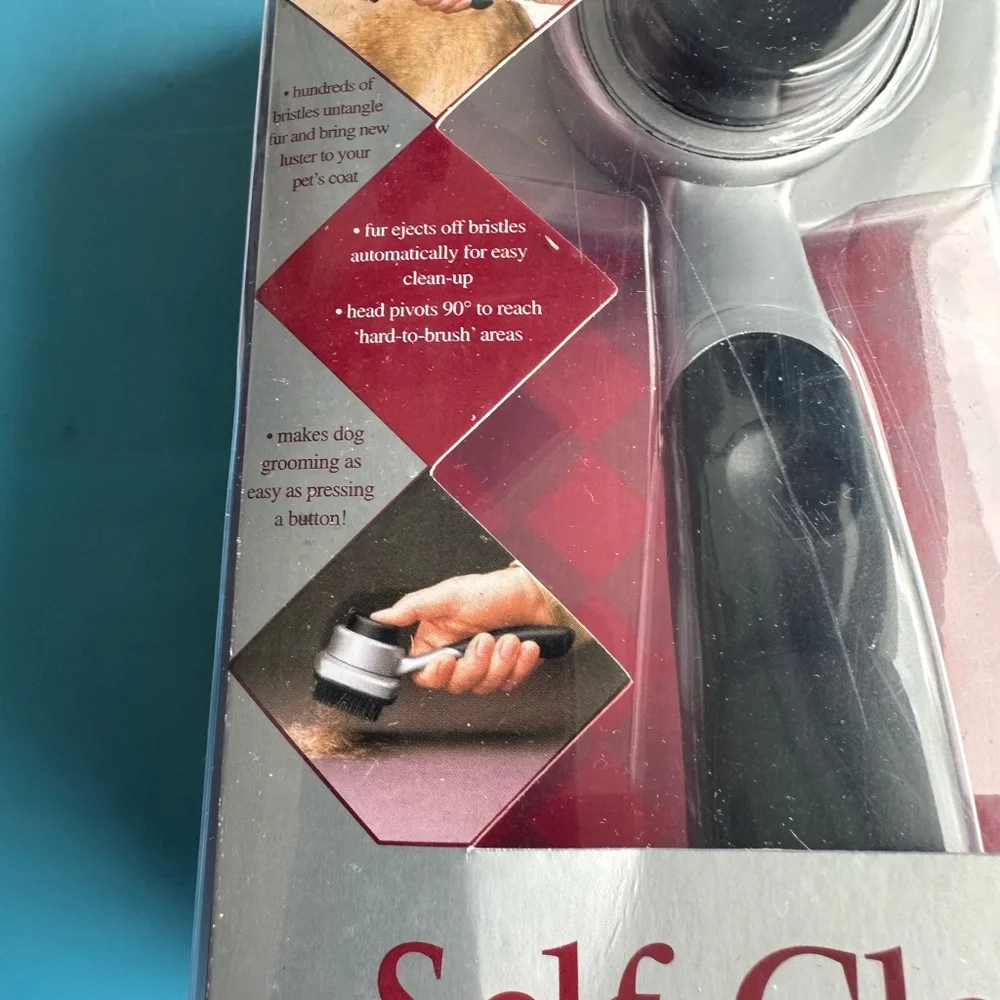 Silver and Black Self-Cleaning Pet Brush